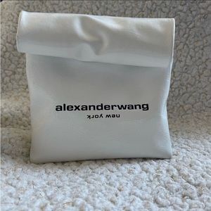 Preowned Alexander Wang Lunch Bag Clutch. Comes with box and all tags.